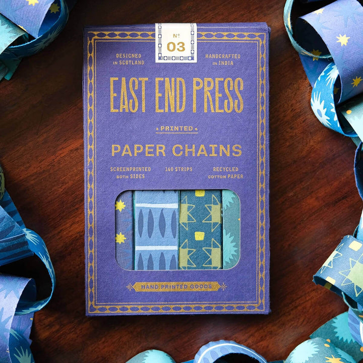 East End Press blue and yellow paper chain kit packaging featuring 160 recycled patterned strips for festive decoration.