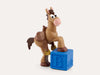 Bullseye horse Tonie standing on blue alphabet block